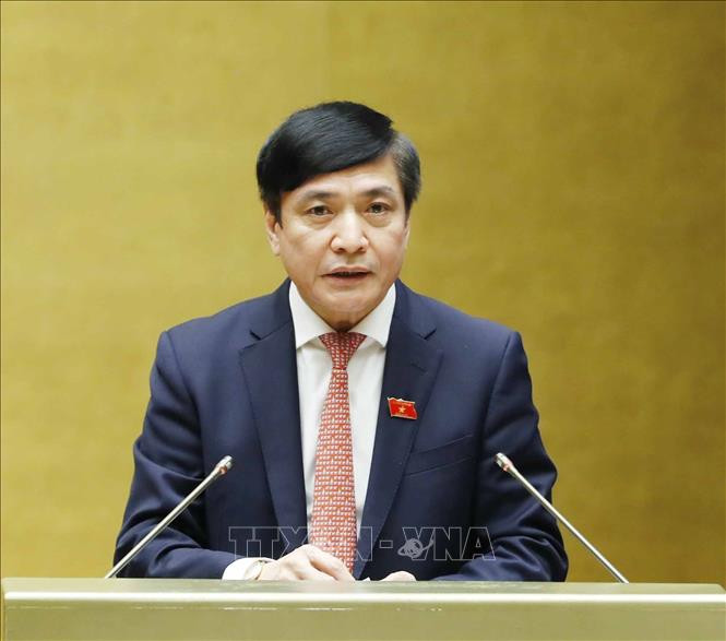 Ủy viên Ủy ban Thường vụ Quốc hội, Tổng Thư ký Quốc hội Bùi Văn Cường trình bày Báo cáo giải trình, tiếp thu, chỉnh lý và dự thảo Nghị quyết Kỳ họp thứ hai, Quốc hội khóa XV. Ảnh: Phương Hoa - TTXVN Bế mạc Kỳ họp thứ 2, Quốc hội khóa XV ảnh 5
