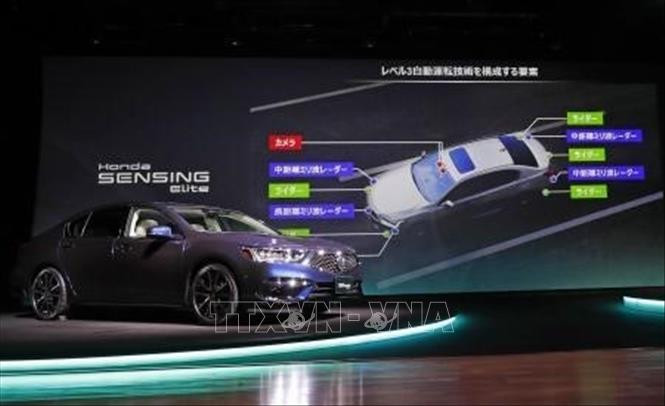 Mẫu ô tô tự hành Legend của Honda được giới thiệu tại Tokyo ngày 4/3/2021. Ảnh: Kyodo/ TTXVN Honda cho ra mắt ô tô tự hành hiện đại nhất tại Nhật Bản ảnh 2