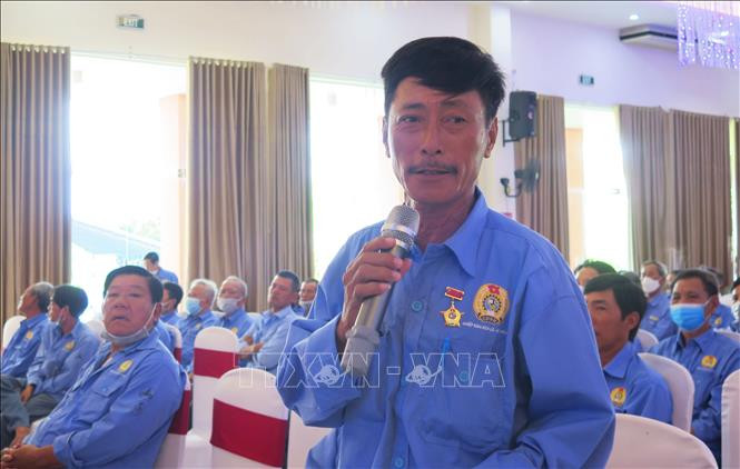 Đoàn viên Nghiệp đoàn Xích lô du lịch Huế phát biểu. Ảnh: Tường Vi - TTXVN Xây dựng thương hiệu xích lô du lịch Huế ảnh 3