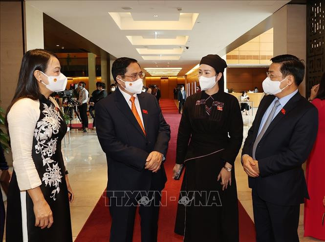 Thủ tướng Chính phủ Phạm Minh Chính với các đại biểu Quốc hội dự phiên bế mạc Kỳ họp thứ hai, Quốc hội khóa XV. Ảnh: Trí Dũng – TTXVN Bế mạc Kỳ họp thứ 2, Quốc hội khóa XV ảnh 4