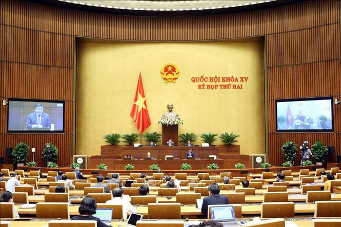 Bộ trưởng Bộ Kế hoạch và Đầu tư Nguyễn Chí Dũng phát biểu giải trình, làm rõ một số vấn đề đại biểu Quốc hội nêu. Ảnh: Phạm Kiên - TTXVN Kỳ họp thứ 2, Quốc hội khóa XV: Đảm bảo đồng bộ chính sách đặc thù làm đòn bẩy phát triển ảnh 1