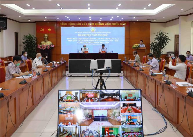Quang cảnh hội nghị tại điểm cầu Hà Nội. Ảnh: Vũ Sinh - TTXVN Hướng chăn nuôi nông hộ tới sản xuất hàng hóa và an toàn sinh học ảnh 1