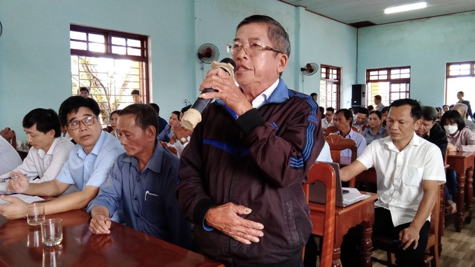 Cử tri Dương Minh Sự, xã Trà Đông, huyện Bắc Trà My mong Nhà nước xây dựng nhiều khu tái định cư để ổn định chỗ ở lâu dài cho đồng bào vùng sạt lở núi. Ảnh: Đoàn Hữu Trung - TTXVN Cử tri huyện miền núi Bắc Trà My mong được tái định cư ổn định, lâu dài, giảm nghèo bền vững ảnh 3