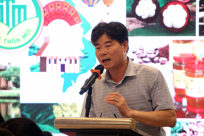 Ông Phương Đình Anh, Phó Chánh Văn phòng Điều phối Nông thôn mới Trung ương thông tin tổng quan về Chương trình OCOP Việt Nam. Ảnh: Kim Há-TTXVN Nâng cao năng lực tham gia xây dựng, phát triển sản phẩm OCOP ảnh 1