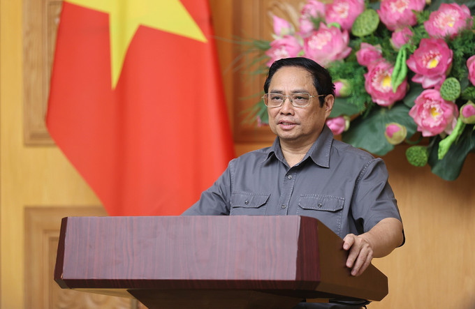 Thủ tướng Phạm Minh Chính chủ trì cuộc họp. Ảnh: Dương Giang-TTXVN Thủ tướng Phạm Minh Chính: Không để người dân đói, rét, không có chỗ ở sau bão, lũ ảnh 1