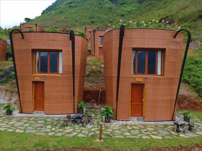 Ngôi nhà hình Quẩy Táu (chiếc địu lưng của dân tộc Mông) tại khu nghỉ dưỡng H’MONG VILLAGE. Ảnh: Nguyễn Chiến-TTXVN Khu nghỉ dưỡng với các ngôi nhà hình Quẩy Tấu xác lập kỷ lục Việt Nam ảnh 3