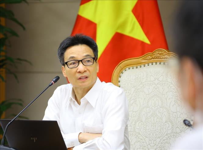 Phó Thủ tướng Vũ Đức Đam. Ảnh: Văn Điệp - TTXVN Gỡ vướng thủ tục xuất nhập cảnh ảnh 1