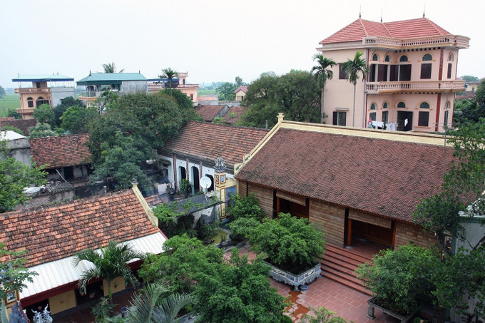 Khu dân cư thôn Văn Xá, xã Nhị Khê, huyện Thường Tín đang đổi thay từng ngày nhờ xây dựng nông thôn mới. Hà Nội xây dựng nông thôn mới văn minh, hiện đại ảnh 1