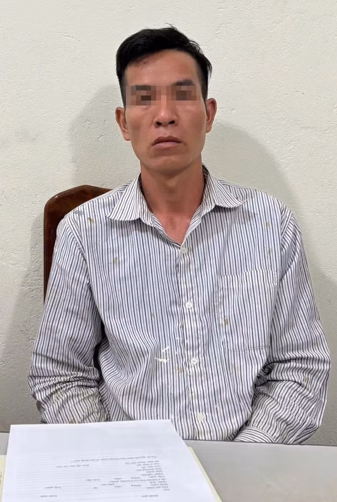 Đối tượng Triệu Văn Hình tại cơ quan Công an. Ảnh: TTXVN phát