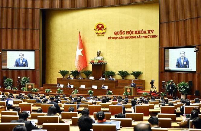 Quốc hội thảo luận ở hội trường về dự thảo Nghị quyết của Quốc hội quy định về việc xử lý một số vấn đề liên quan đến sắp xếp tổ chức bộ máy nhà nước. Ảnh: Doãn Tấn - TTXVN potal-quoc-hoi-thao-luan-ve-sap-xep-to-chuc-bo-may-nha-nuoc-7856234.jpg