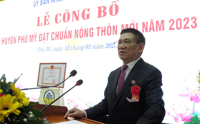 Phó Thủ tướng Chính phủ Hồ Đức Phớc phát biểu tại buổi lễ. Ảnh: Lê Phước Ngọc - TTXVN potal-cong-bo-huyen-phu-my-binh-dinh-dat-chuan-nong-thon-moi-7808418.jpg