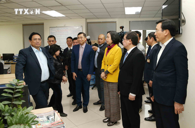Thủ tướng Phạm Minh Chính thăm, kiểm tra công tác trực và chúc Tết tại TTXVN. Ảnh: Tuấn Anh - TTXVN vna_potal_thu_tuong_pham_minh_chinh_tham_kiem_tra_cong_tac_truc_thong_tin_va_chuc_tet_tai_ttxvn_7220138.jpg