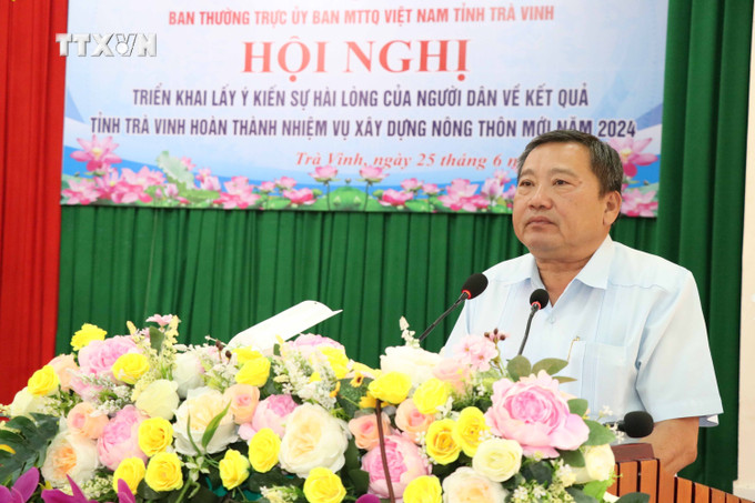Phó Chủ tịch UBND tỉnh Trà Vinh Nguyễn Trung Hoàng phát biểu tại Hội nghị. Ảnh: Thanh Hòa - TTXVN vna_potal_tra_vinh_lay_y_kien_su_hai_long_cua_nguoi_dan_trong_xay_dung_nong_thon_moi_7447746.jpg