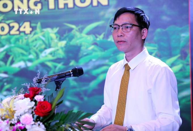 Ông Hoàng Xuân Thuận, Giám đốc Trung tâm xúc tiến đầu tư, thương mại và du lịch tỉnh Lạng Sơn phát biểu tại hội nghị. Ảnh: Văn Đạt - TTXVN vna_potal_lang_son_xay_dung_san_pham_du_lich_nong_thon__7393969.jpg