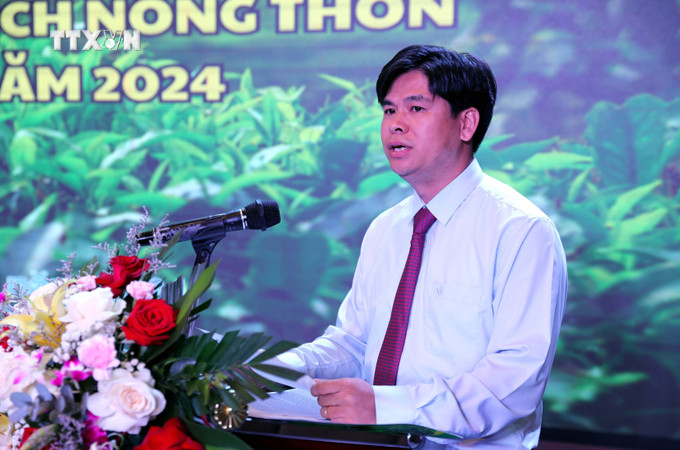Ông Nguyễn Văn Hà, Chủ tịch UBND huyện Đình Lập phát biểu tại hội nghị. Ảnh: Văn Đạt - TTXVN vna_potal_lang_son_xay_dung_san_pham_du_lich_nong_thon__7393968.jpg