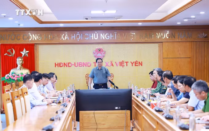 vna_potal_thu_tuong_pham_minh_chinh_dong_vien_nhan_dan_vung_anh_huong_mua_lu_tai_bac_giang_7585146.jpg