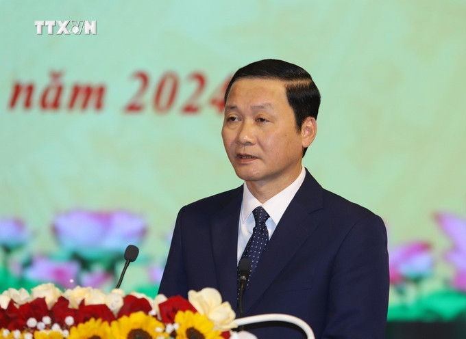 Chủ tịch UBND tỉnh Thanh Hóa Đỗ Minh Tuấn phát biểu khai mạc hội nghị. Ảnh TTXVN phát vna_potal_thanh_hoa_so_ket_5_nam_thuc_hien_ngay_bien_phong_toan_dan_7244731.jpg
