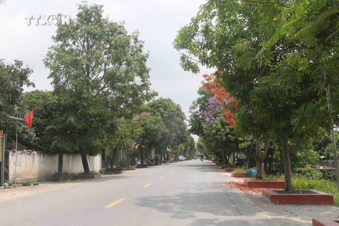 Đường giao thông tại xã Nam Giang (Nam Đàn, Nghệ An). Ảnh: Bích Huệ - TTXVN vna_potal_nam_dan_phan_dau_ve_dich_nong_thon_moi_kieu_mau_vao_nam_2025_7381533.jpg