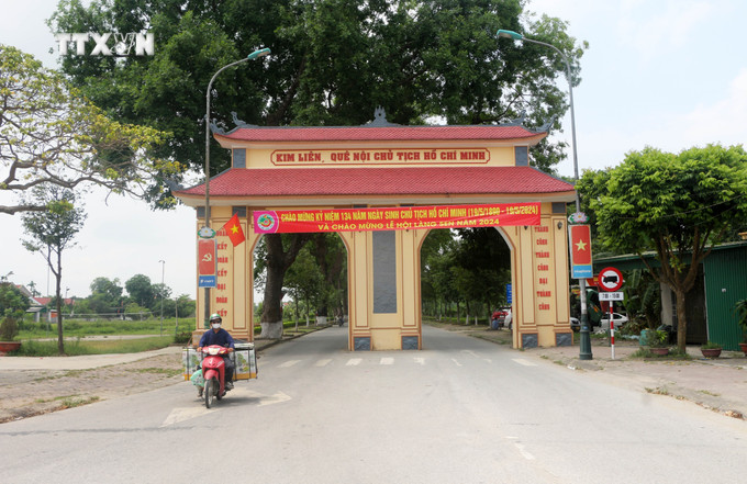 Đường vào làng Hoàng Trù, xã Kim Liên (Nam Đàn, Nghệ An). Ảnh: Bích Huệ - TTXVN vna_potal_nam_dan_phan_dau_ve_dich_nong_thon_moi_kieu_mau_vao_nam_2025_7381466.jpg