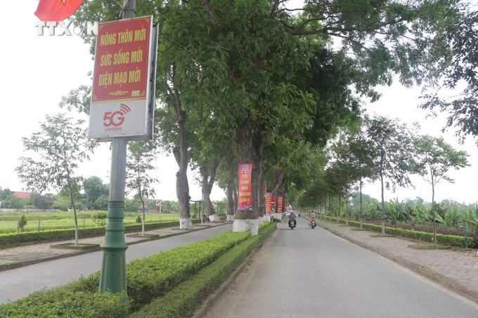 Đường giao thông vào làng Hoàng Trù, xã Kim Liên (Nam Đàn, Nghệ An). Ảnh: Bích Huệ - TTXVN vna_potal_nam_dan_phan_dau_ve_dich_nong_thon_moi_kieu_mau_vao_nam_2025_7381470.jpg