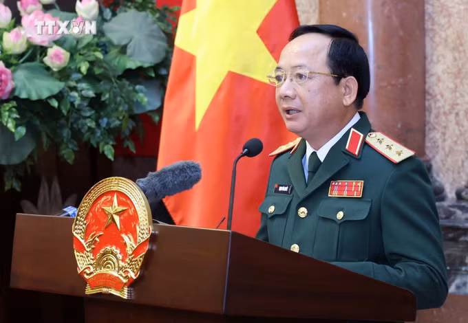 vna_potal_chu_tich_nuoc_trao_quyet_dinh_bo_nhiem_chuc_vu_chu_nhiem_tong_cuc_chinh_tri_qdnd_cho_thuong_tuong_trinh_van_quyet_7409699.jpg