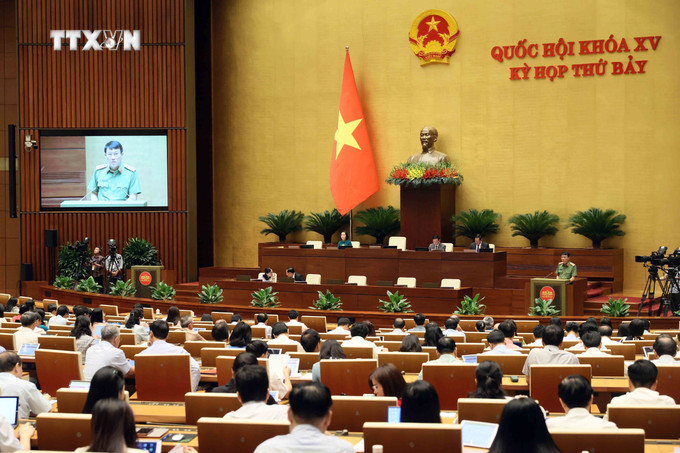 Bộ trưởng Bộ Công an Lương Tam Quang trình bày Tờ trình về dự án Luật Phòng cháy, chữa cháy và cứu nạn, cứu hộ. Ảnh: An Đăng - TTXVN vna_potal_ky_hop_thu_7_quoc_hoi_khoa_xv_quoc_hoi_thao_luan_ve_chu_truong_dau_tu_chuong_trinh_muc_tieu_quoc_gia_ve_phat_trien_van_hoa_giai_doan_2025_-__7437793.jpg