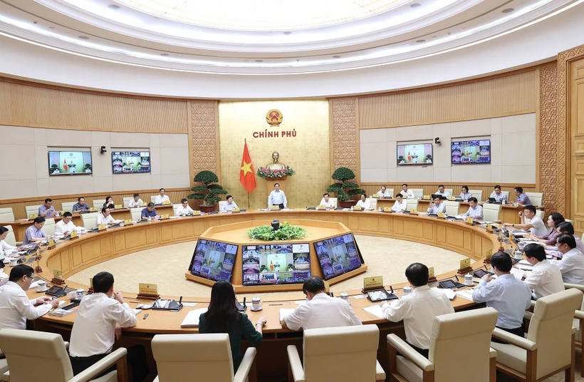 Quang cảnh hội nghị tại điểm cầu Chính phủ. Ảnh: Dương Giang-TTXVN