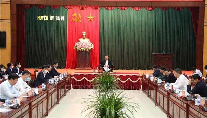Bí thư Thành ủy Đinh Tiến Dũng phát biểu tại buổi làm việc. Ảnh: TTXVN
