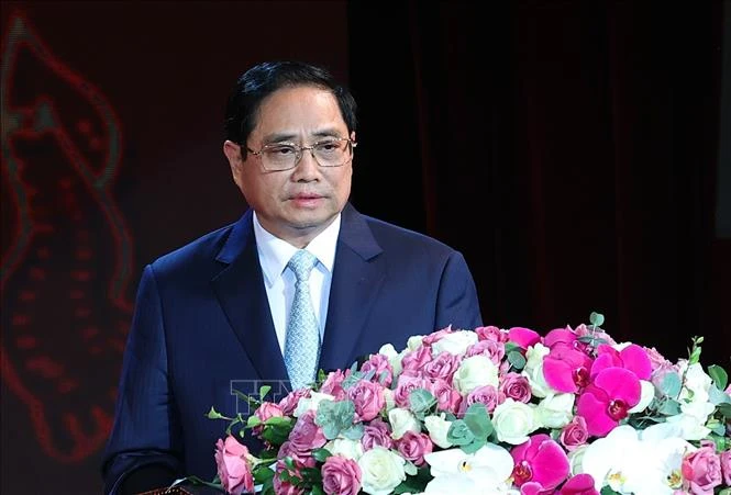 Thủ tướng Phạm Minh Chính dự và phát biểu chia sẻ với cán bộ, chiến sĩ và đồng bào cả nước tại chương trình giao lưu nghệ thuật “Nghĩa tình quân dân". Ảnh: Dương Giang-TTXVN