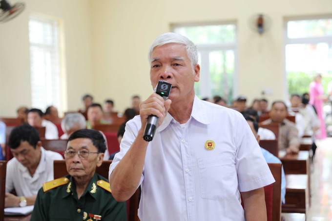 Cử tri phường Thảo Nguyên, tỉnh Sơn La, phát biểu kiến nghị tại hội nghị. son-la-txct2-110725.jpg