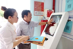 Đồng bộ tổ chức, nâng chất phục vụ nhân dân