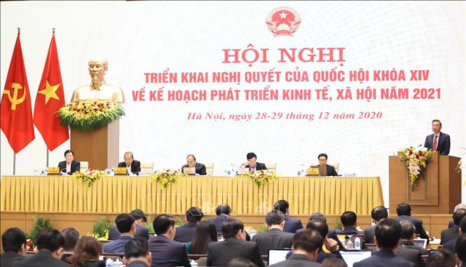 Thủ tướng Nguyễn Xuân Phúc chủ trì Hội nghị Chính phủ với các địa phương (triển khai Nghị quyết của Quốc hội khóa XIV về kế hoạch triển khai phát triển kinh tế - xã hội năm 2021. Ảnh: Thống Nhất – TTXVN