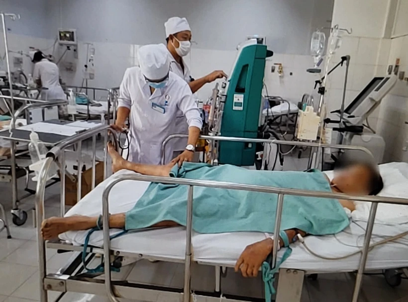 Bà C.T.L sau khi được các y, bác ỹ chăm sóc sức khỏe đã ổn định. Ảnh: TTXVN phát