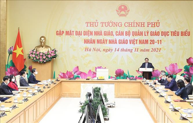 Quang cảnh buổi gặp mặt. Ảnh: Dương Giang - TTXVN Thủ tướng Phạm Minh Chính: Các nhà giáo đang thực hiện sứ mệnh rất vẻ vang và đáng tự hào ảnh 4