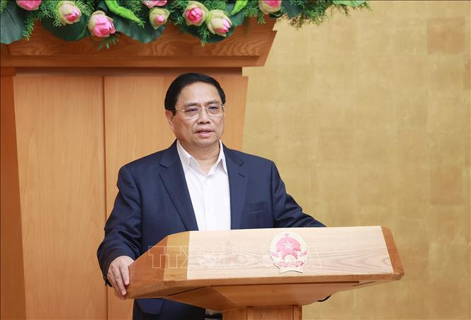Thủ tướng Phạm Minh Chính chủ trì Hội nghị trực tuyến Chính phủ với địa phương. Ảnh: Dương Giang-TTXVN Thủ tướng Phạm Minh Chính: Nỗ lực lớn hơn để giữ mục tiêu tăng trưởng, kiểm soát lạm phát năm 2023 ảnh 1