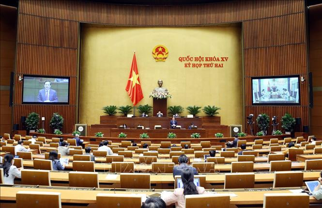 Bộ trưởng Bộ Lao động, Thương binh và Xã hội Đào Ngọc Dung phát biểu giải trình, làm rõ một số vấn đề đại biểu Quốc hội nêu. Ảnh: Phạm Kiên - TTXVN Thông cáo báo chí số 8, Kỳ họp thứ 2, Quốc hội khóa XV ảnh 1