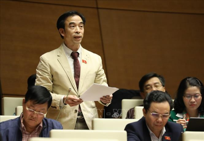 Đại biểu Quốc hội thành phố Hà Nội Nguyễn Quang Tuấn phát biểu. Ảnh: Văn Điệp - TTXVN Kỳ họp thứ 10, Quốc hội khóa XIV: Nâng cao đời sống đồng bào dân tộc thiểu số và miền núi ảnh 1