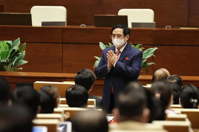 Thủ tướng Phạm Minh Chính dự Phiên khai mạc. Ảnh: Dương Giang - TTXVN Khai mạc trọng thể Kỳ họp thứ nhất, Quốc hội khóa XV ảnh 8