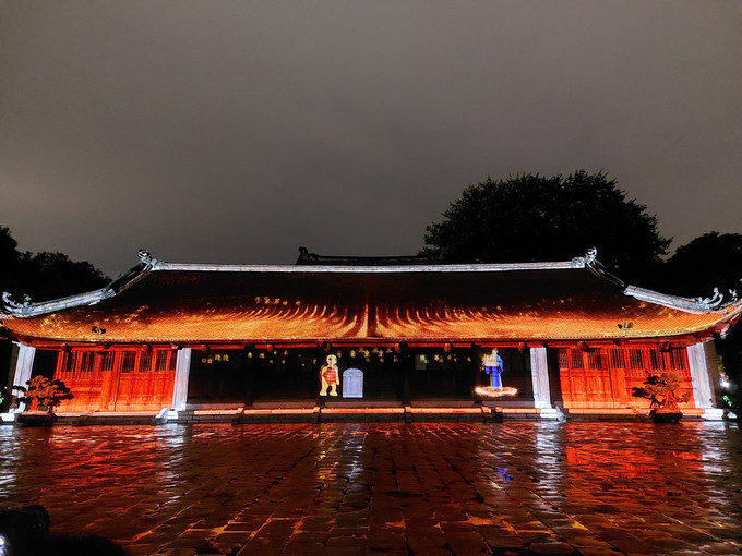 Màn trình chiếu công nghệ 3D Mapping "Tinh hoa đạo học". Ảnh: Đinh Thuận – TTXVN Tour đêm Văn Miếu – Quốc Tử Giám: Tinh hoa đạo học ảnh 3