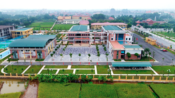 Trường Trung học cơ sở trọng điểm tại huyện Vĩnh Tường được xây dựng khang trang, hiện đại. Ảnh: vinhphuc.edu.vn Vĩnh Phúc tăng cường đầu tư cơ sở vật chất cho giáo dục ảnh 1