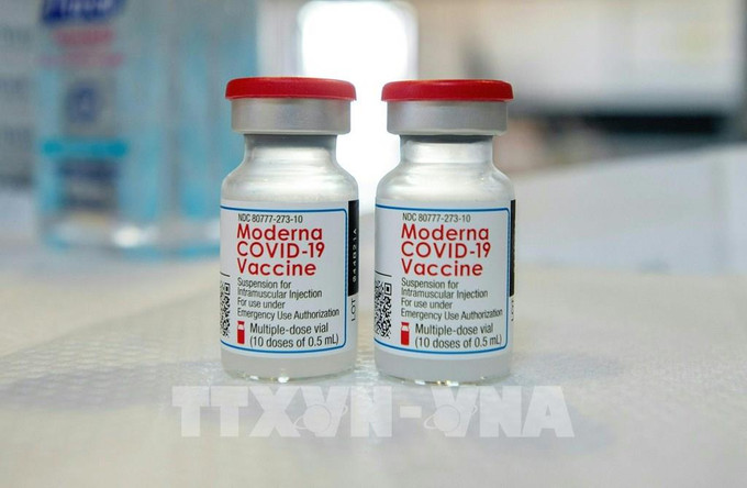 Vaccine ngừa COVID-19 của Moderna. Ảnh: AFP/TTXVN Tìm hiểu về vaccine phòng COVID-19 của công ty Moderna ảnh 1