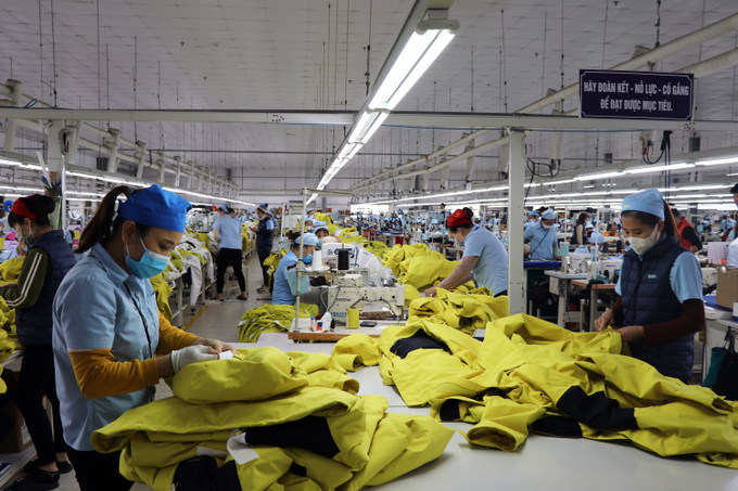 Công nhân Công ty TNHH MSA-YB may gia công hàng may mặc xuất khẩu. Ảnh: Vũ Quang- TTXVN Sớm đưa Tuyên Quang trở thành tỉnh phát triển khá, toàn diện, bền vững trong khu vực ảnh 1