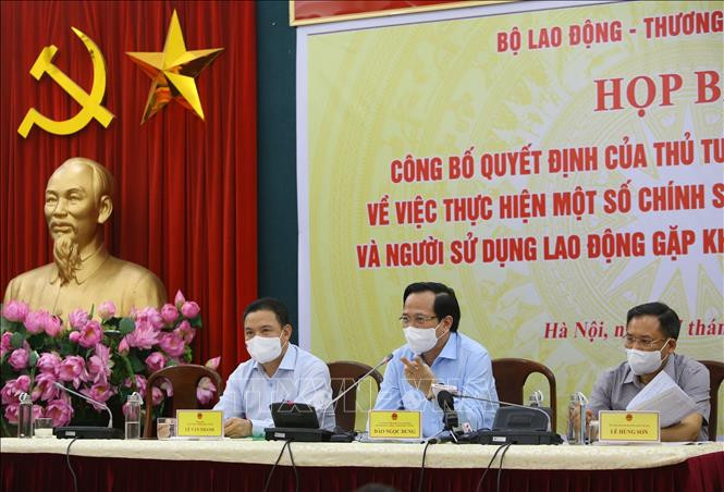 Bộ trưởng Bộ Lao động - Thương binh và Xã hội Đào Ngọc Dung phát biểu tại buổi họp báo. Ảnh: Hoàng Hiếu - TTXVN Từ ngày 8/7, người lao động và người sử dụng lao động có thể tiếp cận gói hỗ trợ trị giá 26.000 tỷ đồng ảnh 1