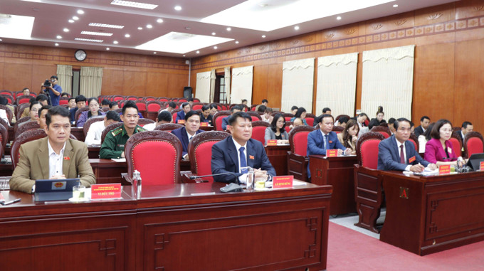 Các đại biểu dự Kỳ họp. Ảnh: Nguyễn Cường - TTXVN Sơn La bố trí ngân sách thực hiện dự án xây dựng tuyến đường bộ cao tốc Hòa Bình - Mộc Châu ảnh 2