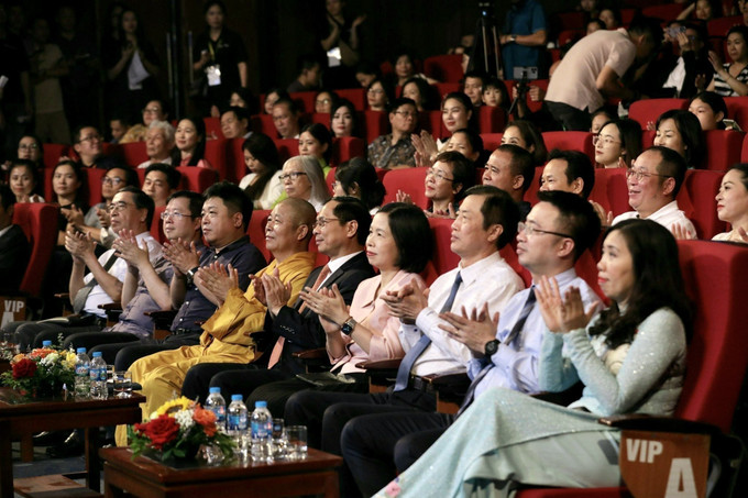 Các đại biểu dự chương trình. Ảnh:TTXVN phát Tiếng Việt - niềm tự hào, phát huy tự tôn dân tộc của cộng đồng người Việt Nam ở nước ngoài ảnh 4