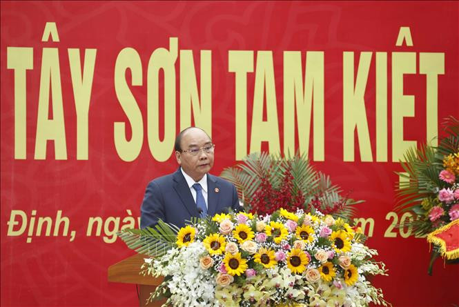 Chủ tịch nước Nguyễn Xuân Phúc phát biểu tại Lễ khánh thành Đền thờ Tây Sơn Tam Kiệt. Ảnh: Thống Nhất – TTXVN Chủ tịch nước Nguyễn Xuân Phúc dự lễ khánh thành Đền thờ Tây Sơn Tam Kiệt ảnh 3