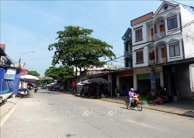 Một góc khu vực chợ xã Tân Trào. Ảnh: Vũ Quang – TTXVN Nhiều đổi thay trên quê hương cách mạng Tân Trào ảnh 2