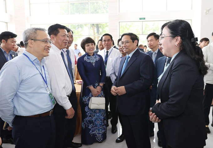 Thủ tướng Phạm Minh Chính với các đại biểu dự hội nghị. Ảnh: Dương Giang-TTXVN Thủ tướng Phạm Minh Chính: Thực hiện Nghị quyết 11-NQ/TW cần có cách tiếp cận tổng thể gắn với giải pháp cụ thể, linh hoạt, hiệu quả, sát thực tiễn ảnh 5
