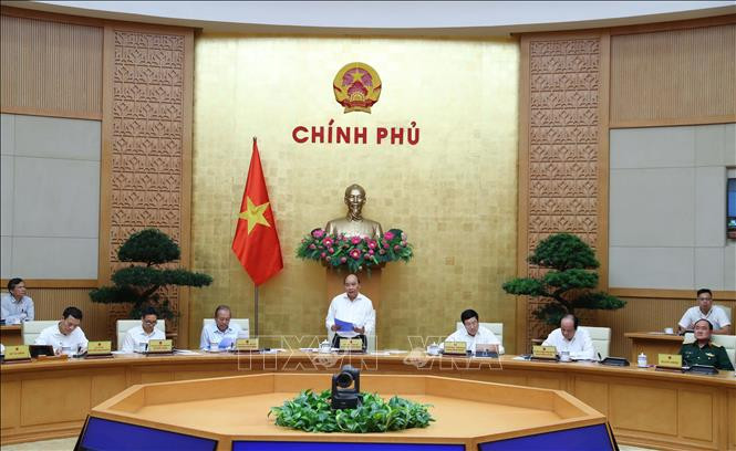 Thường trực Chính phủ họp trực tuyến với Hà Nội và Thành phố Hồ Chí Minh. Ảnh: Thống Nhất – TTXVN Ban hành Nghị quyết 99 về đẩy mạnh phân cấp quản lý nhà nước theo ngành, lĩnh vực ảnh 1