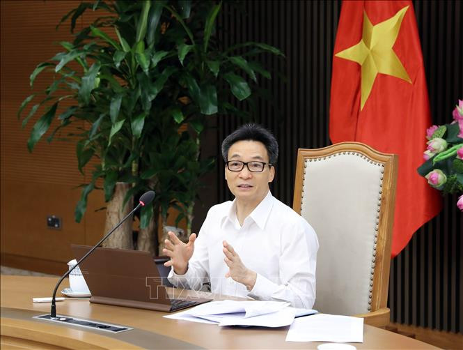 Phó Thủ tướng Chính phủ Vũ Đức Đam, Trưởng Ban Chỉ đạo Quốc gia phòng, chống dịch COVID-19 phát biểu. Ảnh: Phạm Kiên - TTXVN Tạo mọi điều kiện thuận lợi cho các đơn vị trong nước nghiên cứu, sản xuất vaccine ngừa COVID-19 ảnh 1